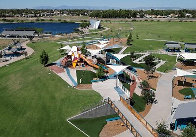 Aerial view of colorful playground by lake